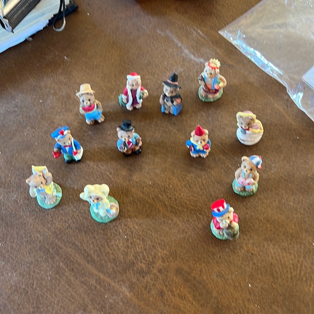 Vintage 12 piece bears of the year set. There is a bear that depicts each month.